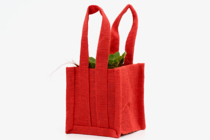 Red jute bag suitable for Christmas gifts and putting succulent plants inside 